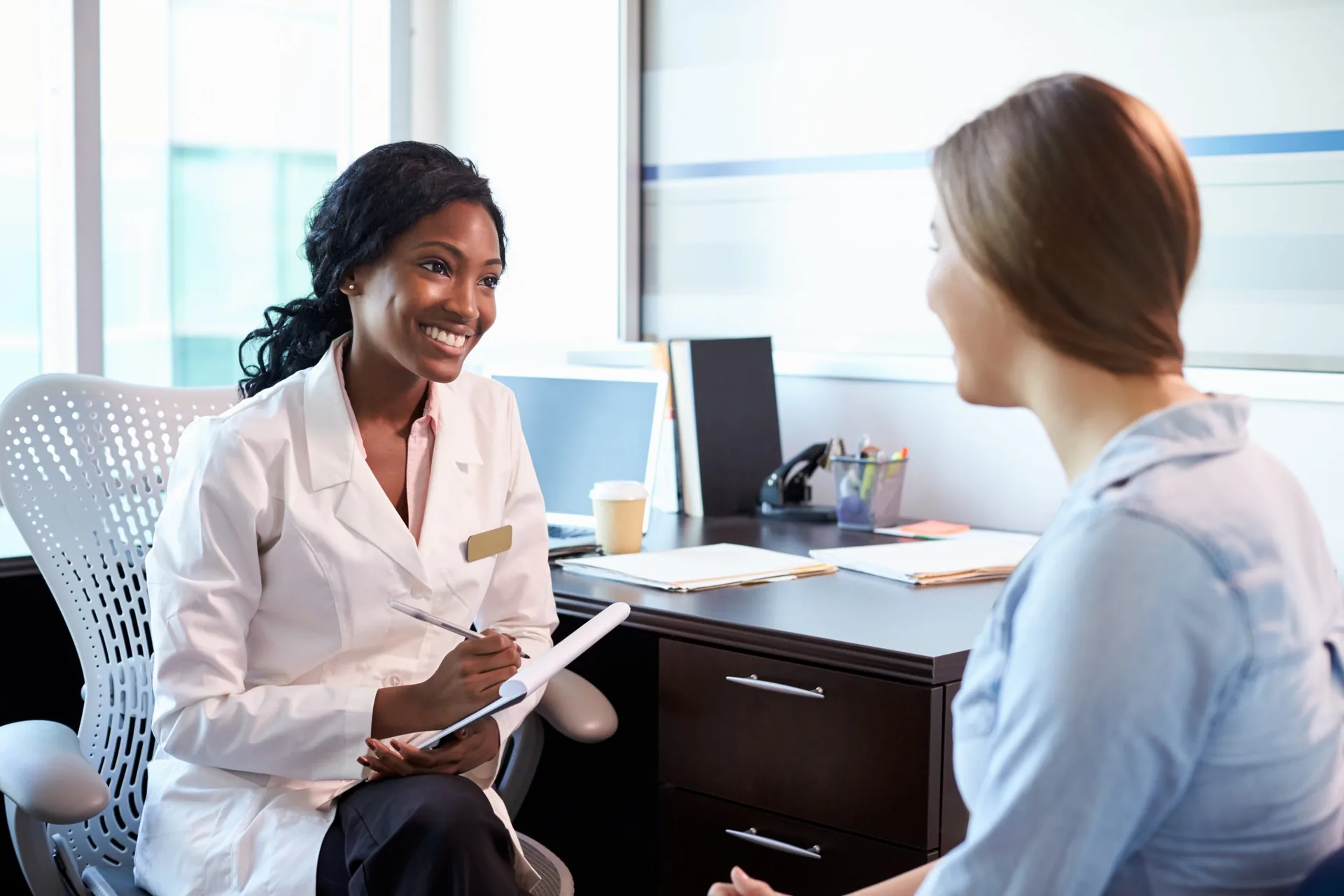 doctor-consultation-female-patient-office