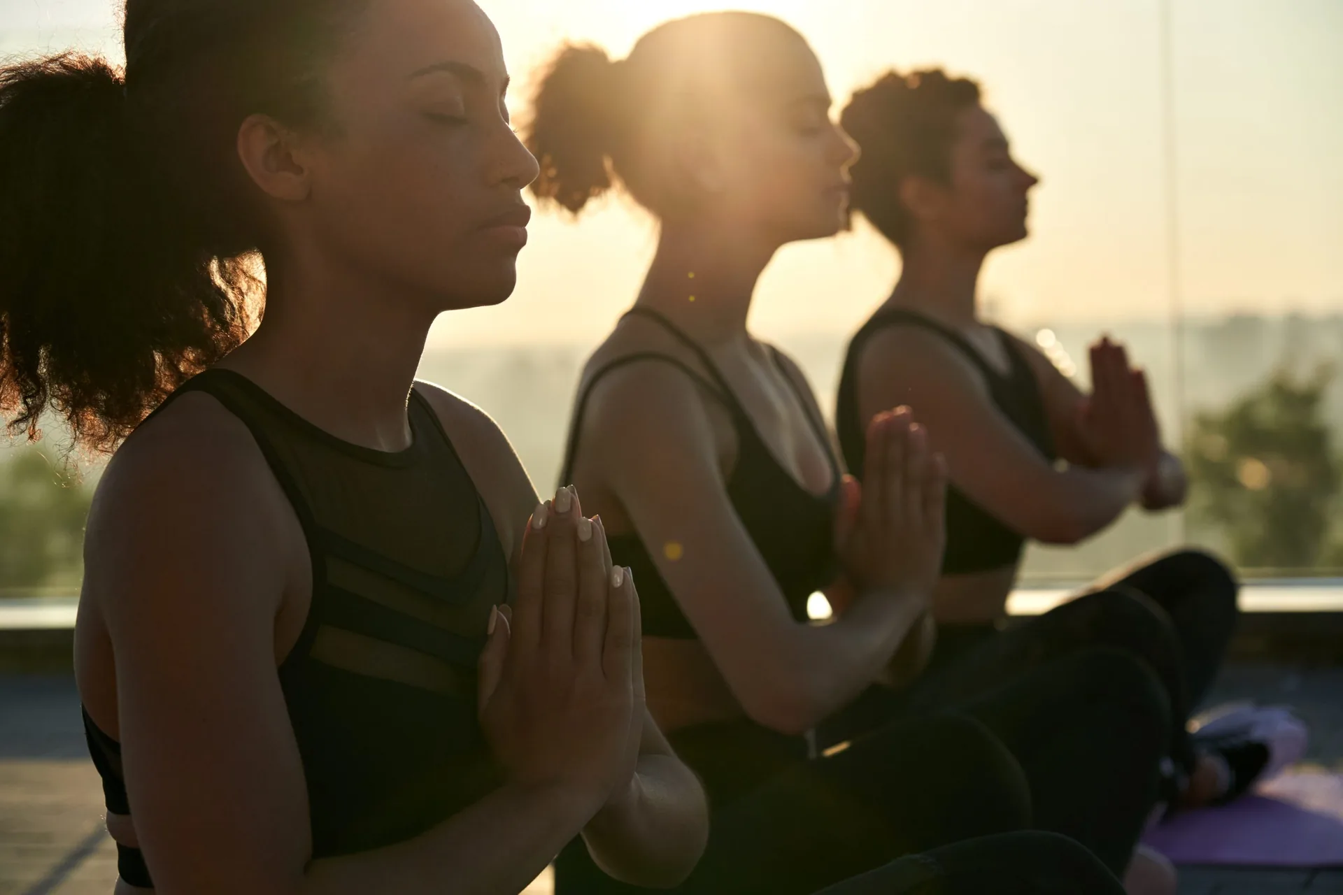 woman meditate sit namaste eyes closed doing breathing exercises practice relaxing