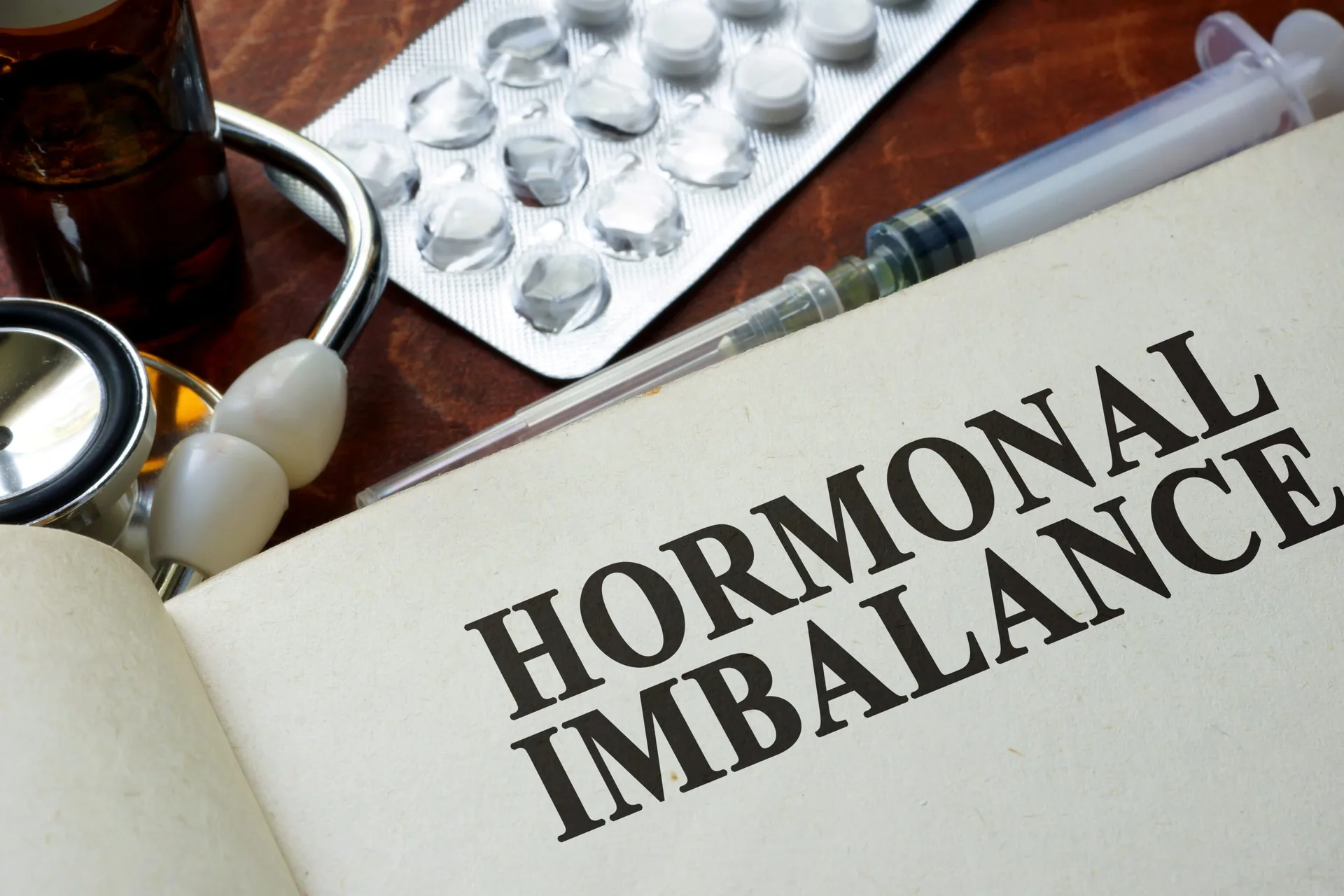 Book-with-words-hormonal-imbalance-on-a-table