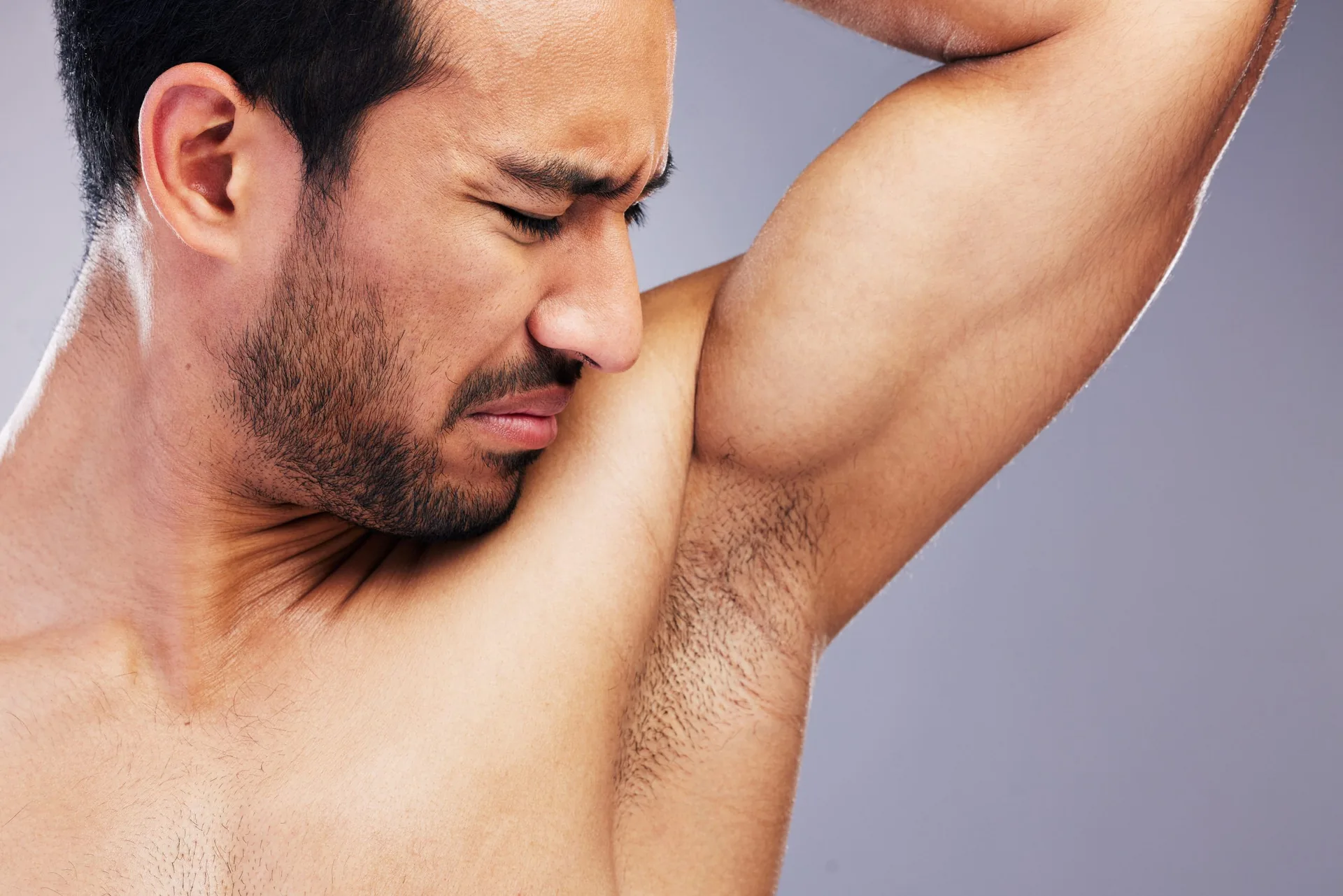 Underarm-bad-smell-and-model-with-hyperhidrosis-sweating-or-poor-hygiene