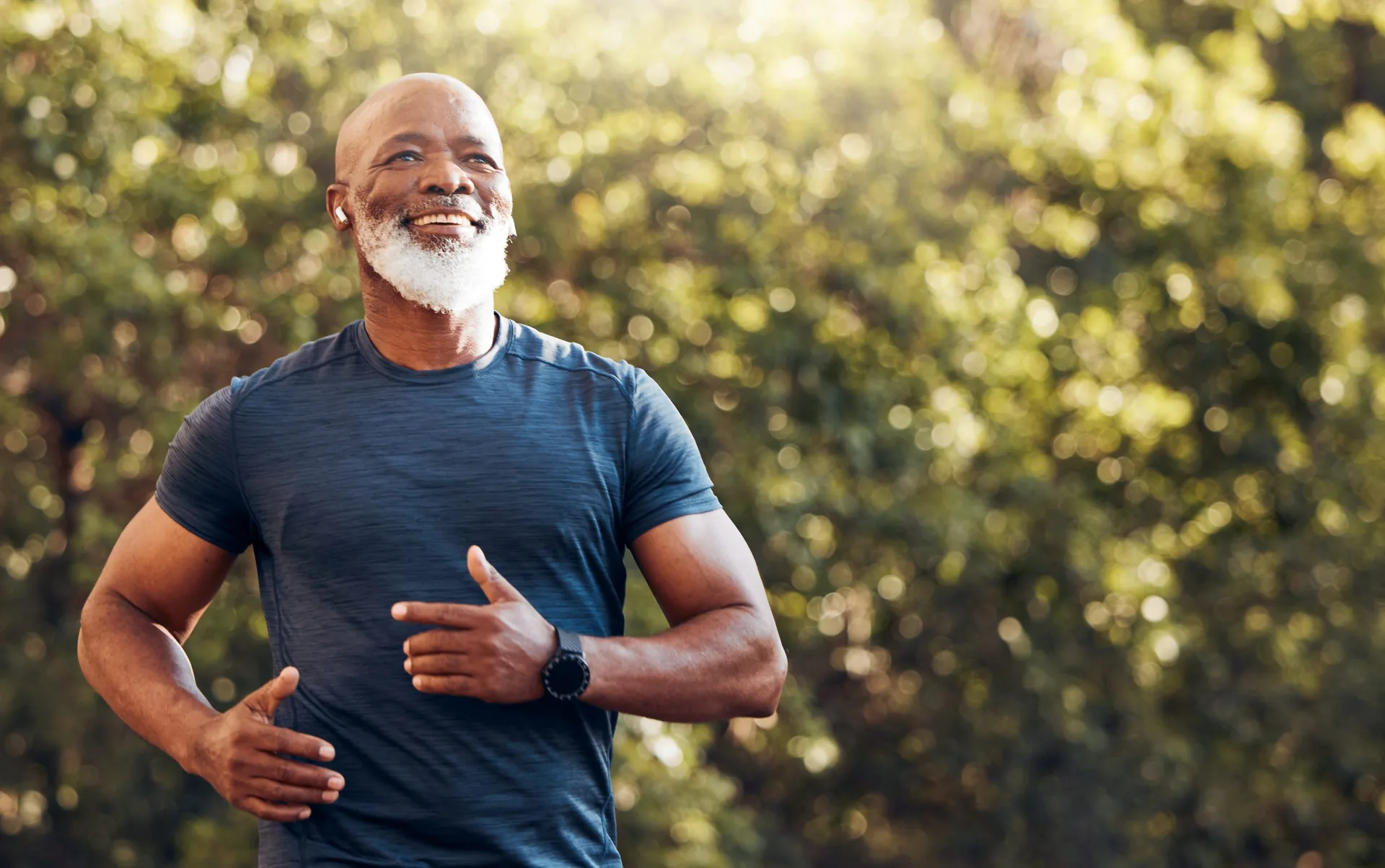 happy-black-man-running-park-music-