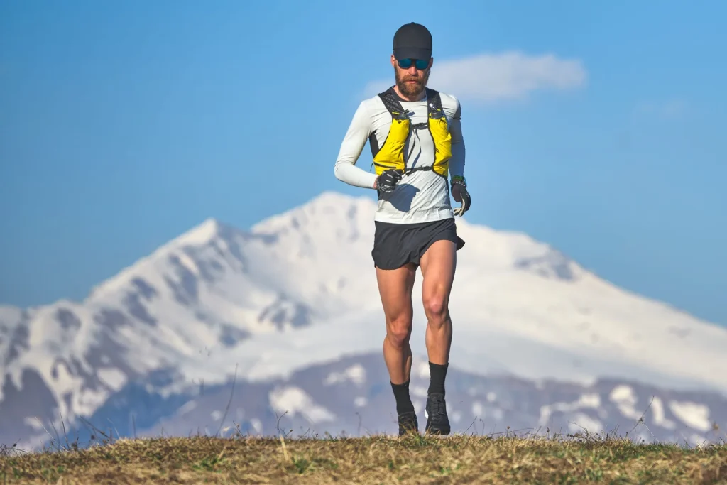 man-travel-athlete-mountains-high-altitude