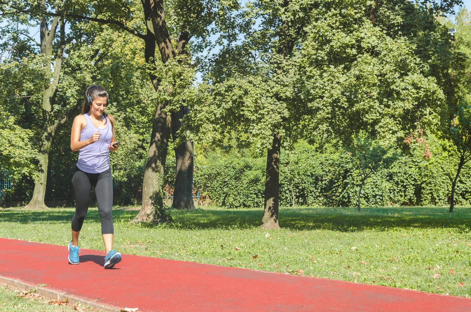 girl-walking-fast-on-track-running
