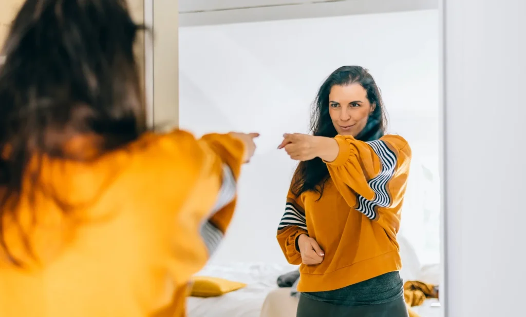 self-confident-single-woman-pointing-finger