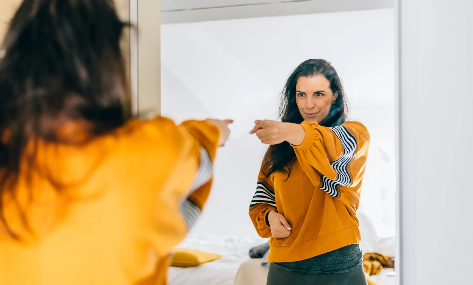 self-confident-single-woman-pointing-finger