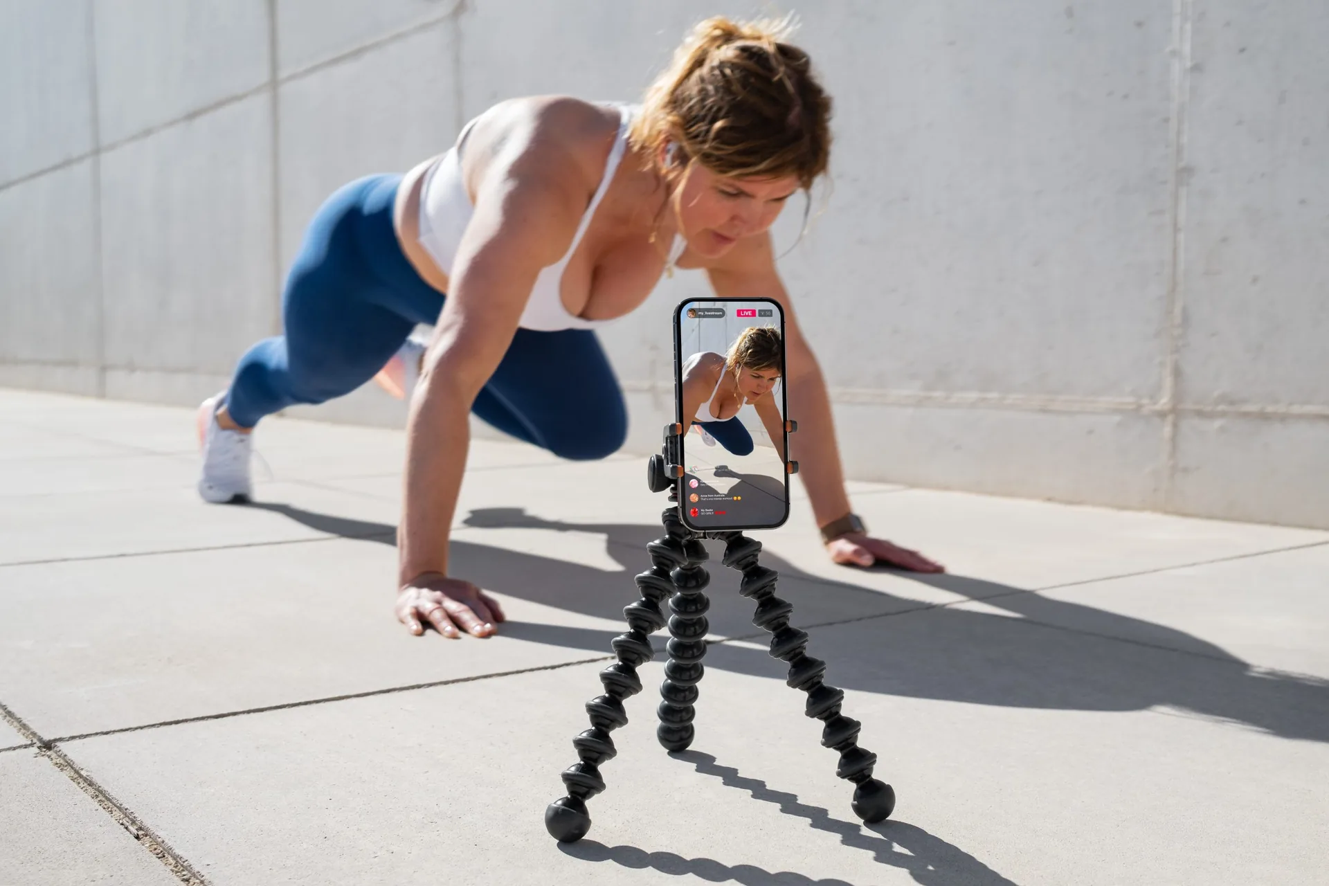 woman-film-herself-on-mobile-phone