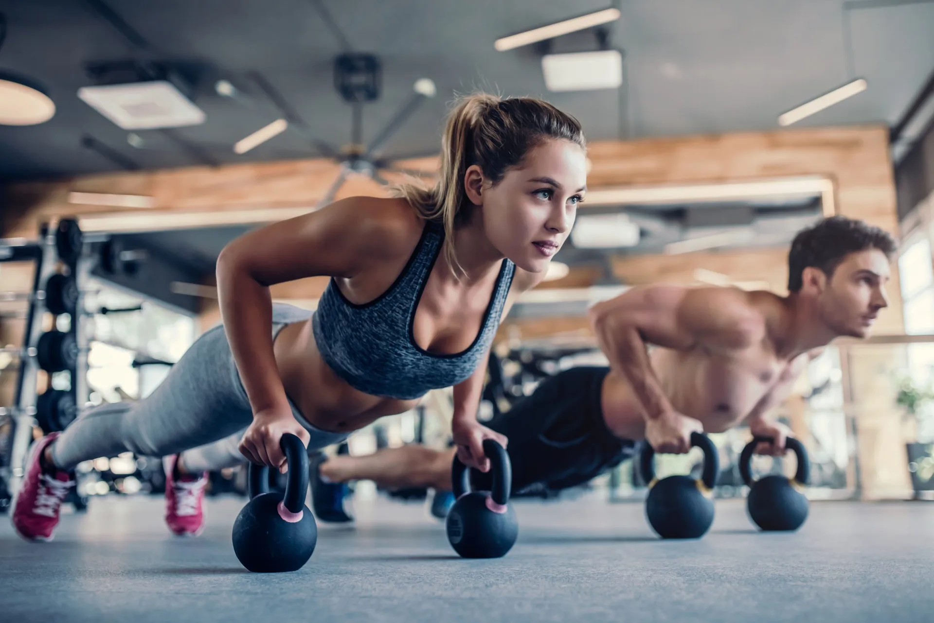 young-couple-working-out-gym-attractive