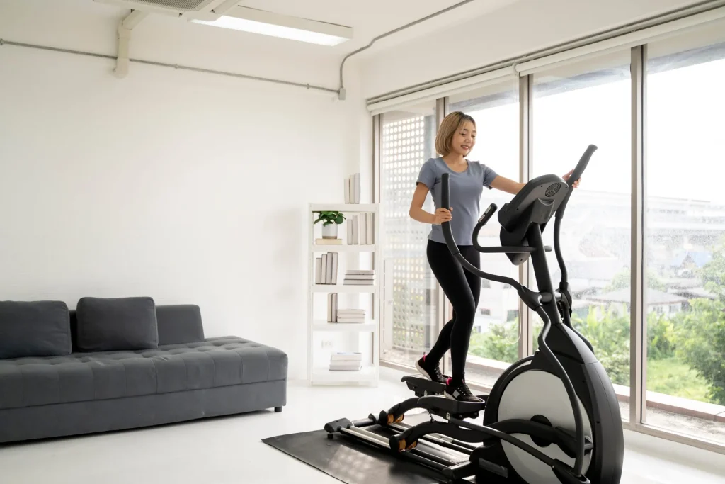 fit-woman-using-stationary-bike-cardio