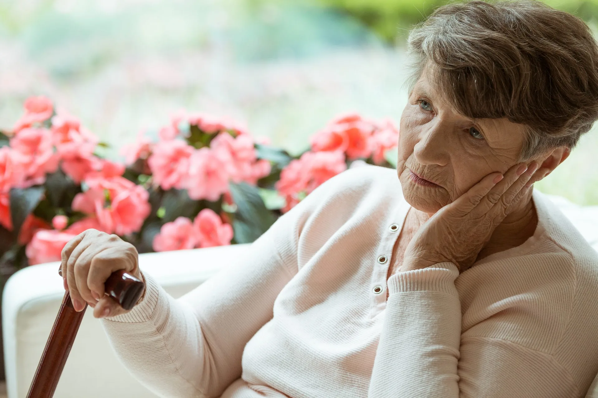 sad-elder-lady-sitting-on-sofa
