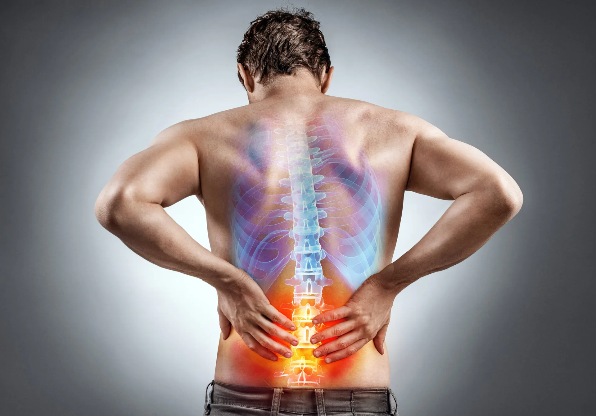 lower-back-pain-man-holding-his