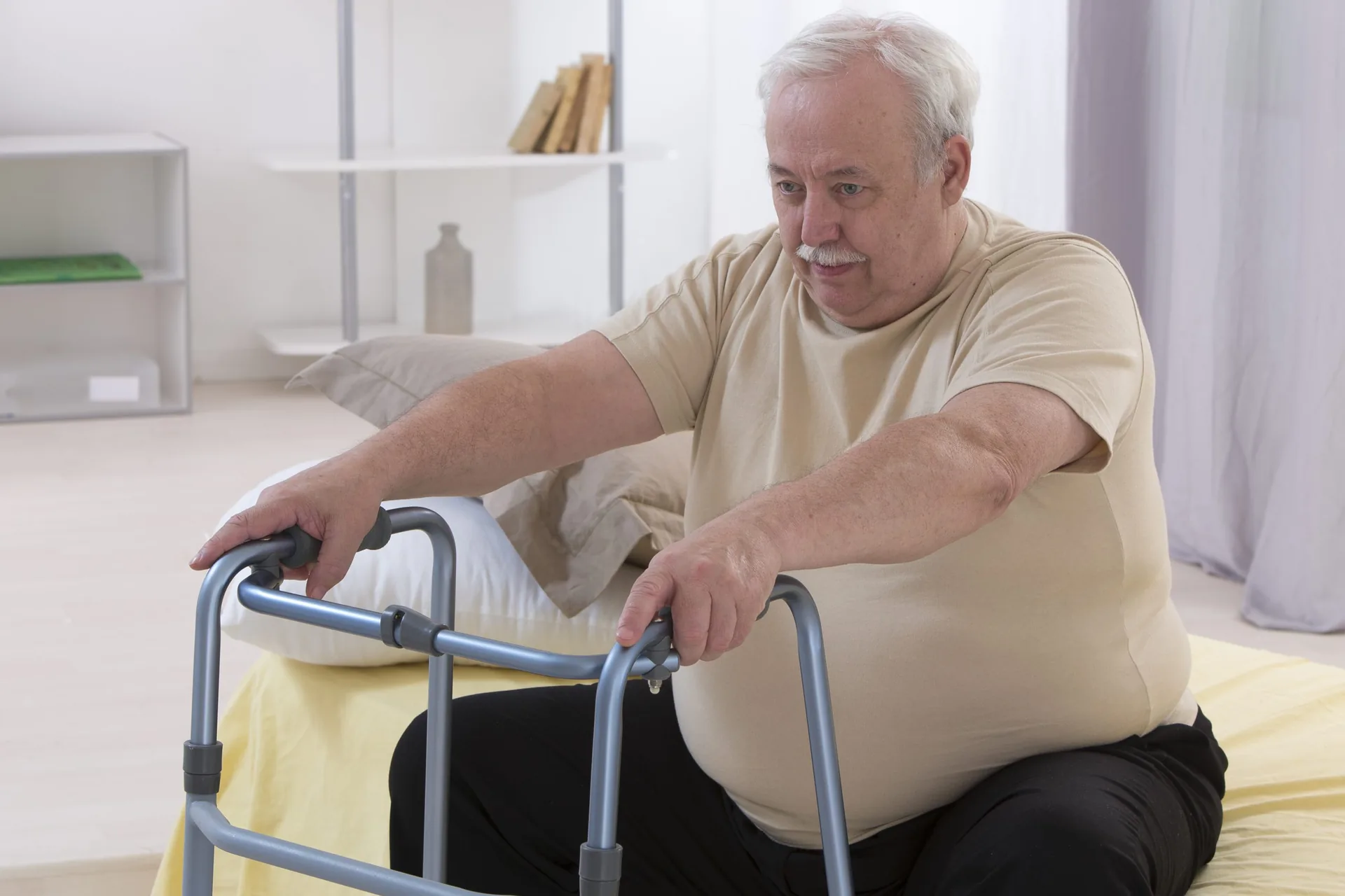 senior-man-using-walking-frame