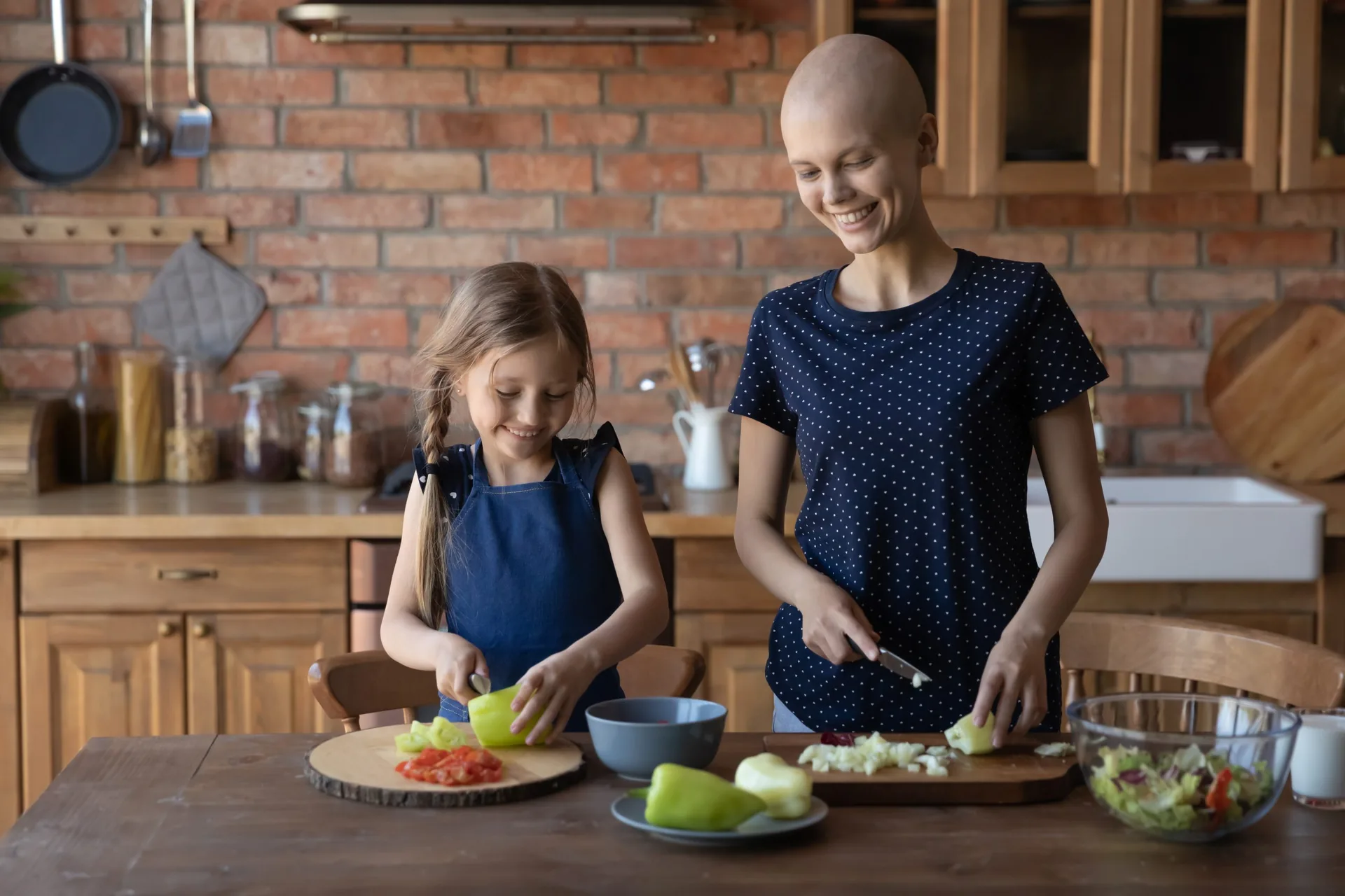 happy-daughter-child-helping-cancer-patient