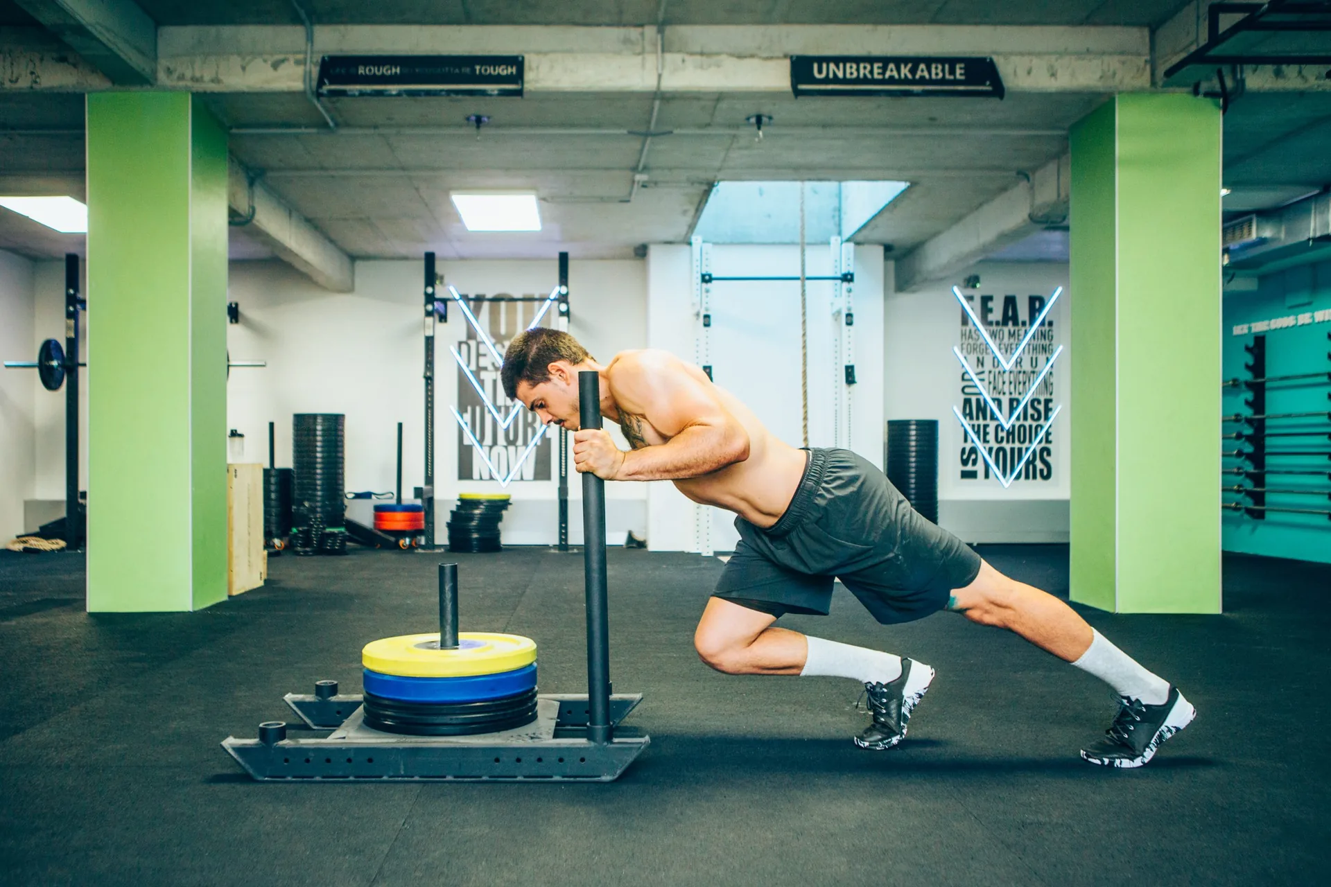 muscular-strong-young-man-pushing-exercise