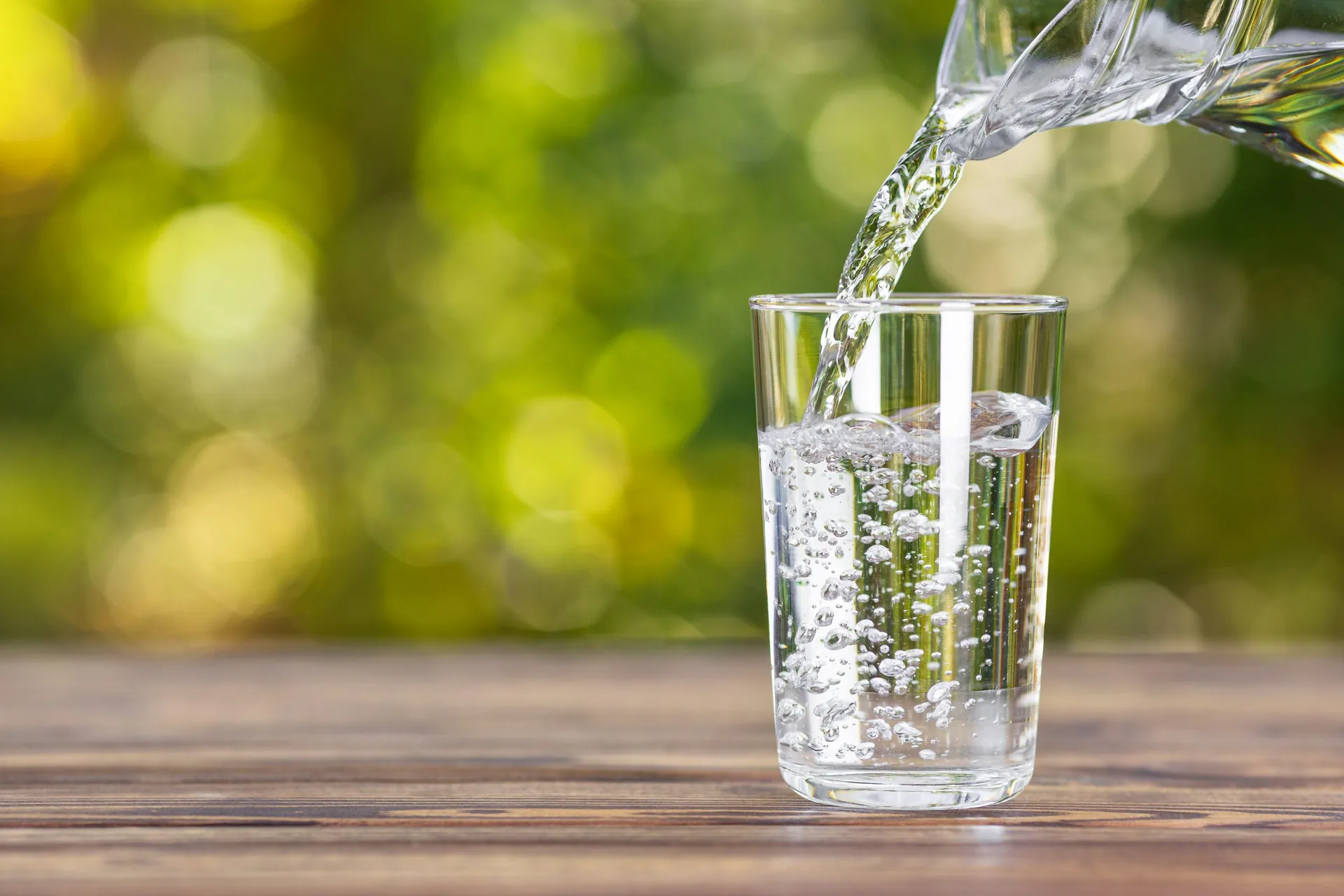 water-jug-pouring-into-glass-on