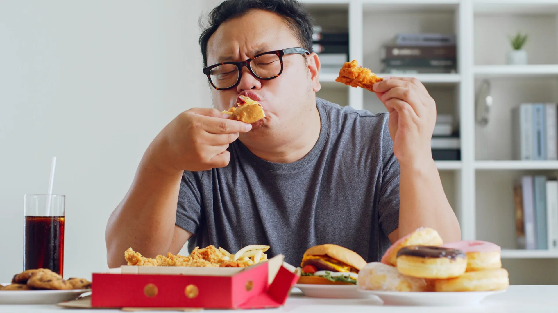 asian-fat-man-enjoy-eat-unhealthy