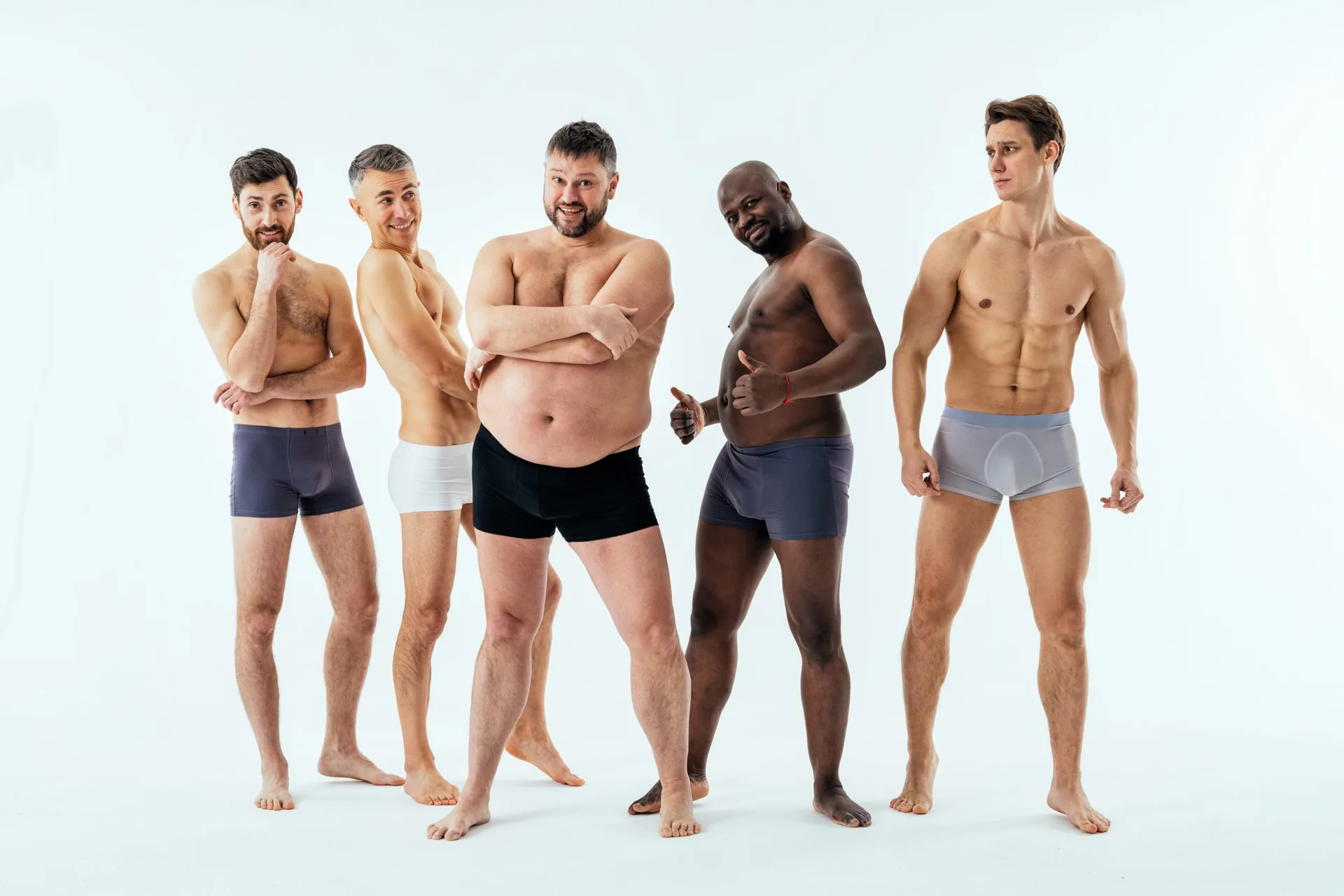 xgroup-multiethnic-men-posing-male-edition
