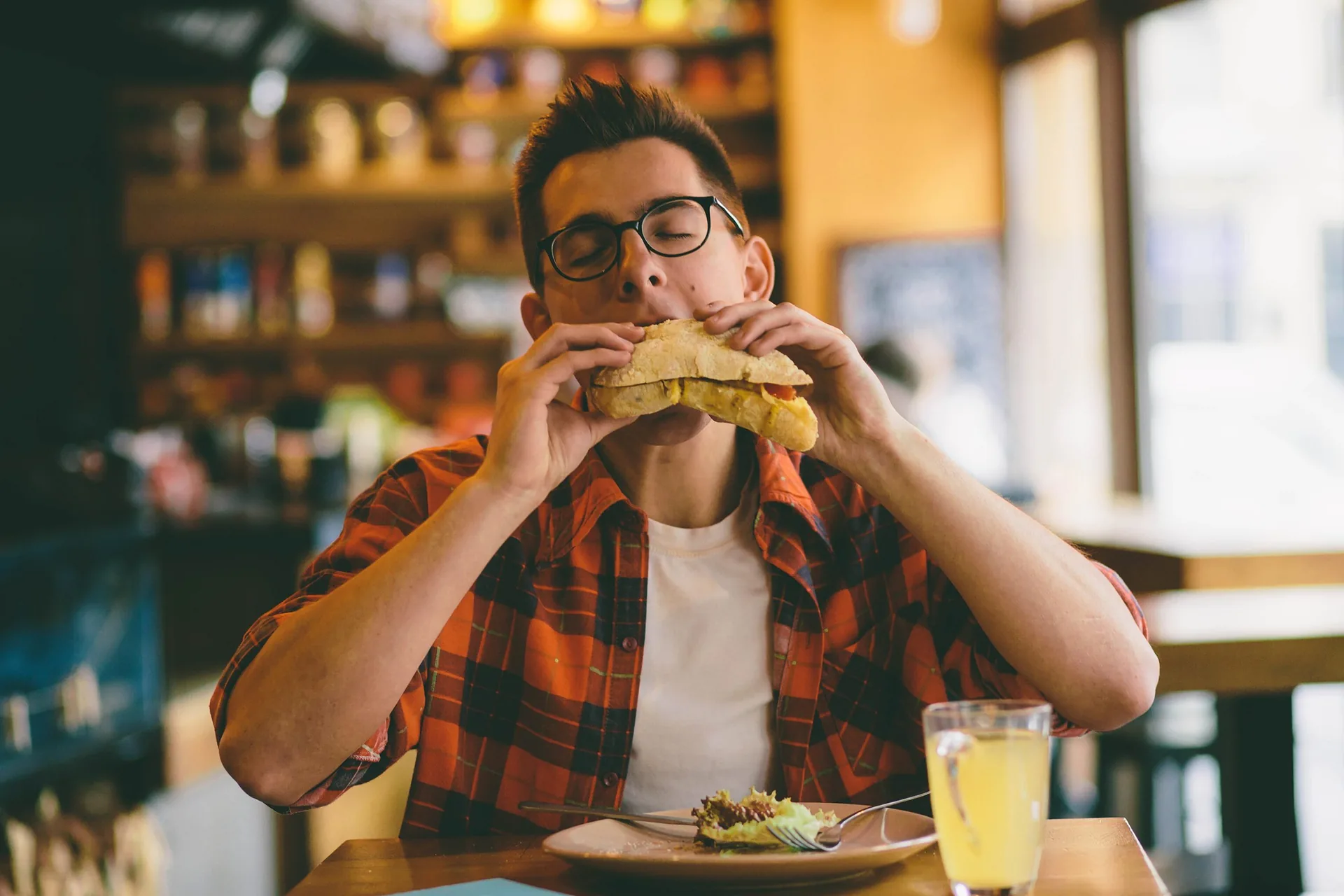 man-eating-restaurant-enjoying-delicious-food