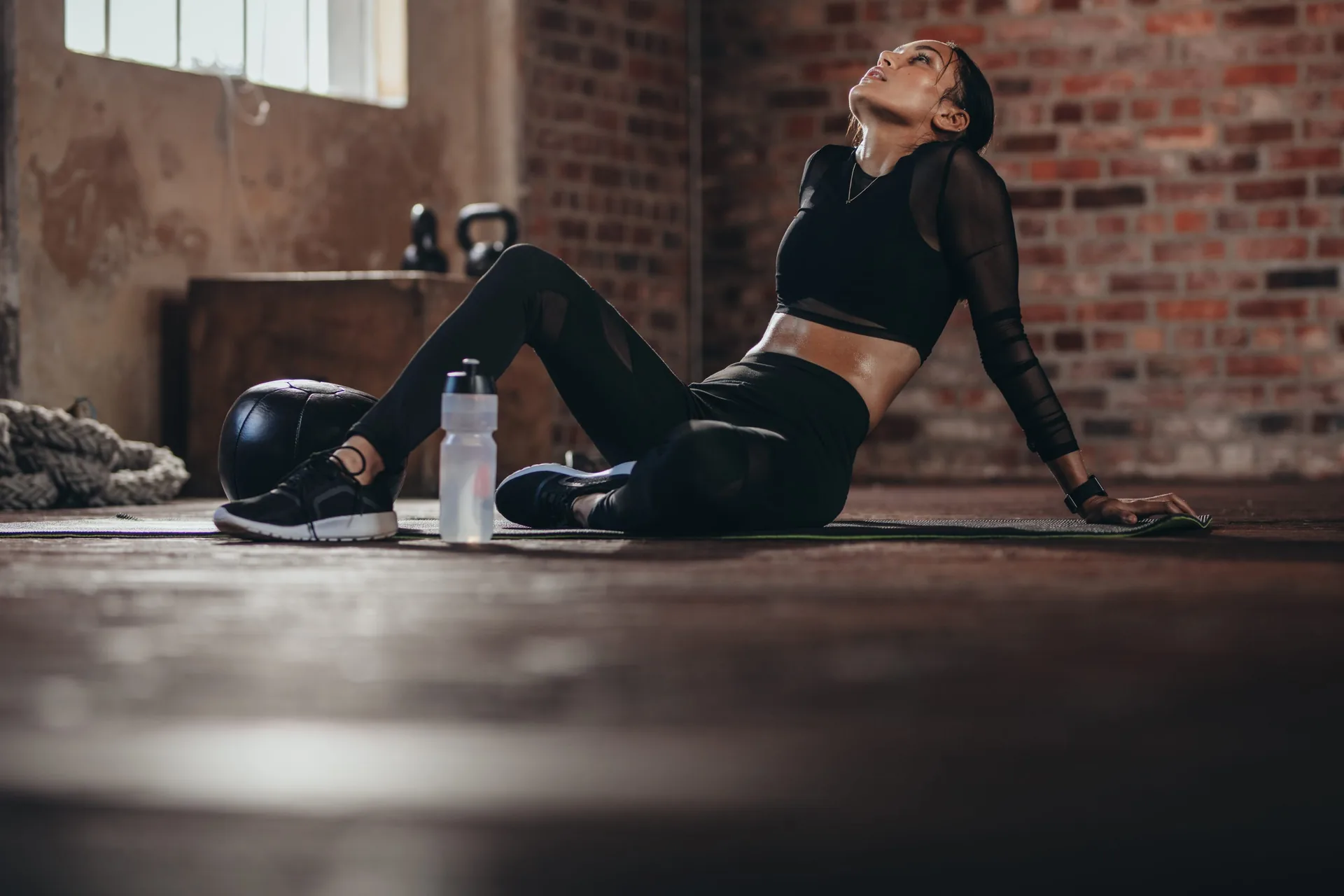 tired-woman-having-rest-after-workout