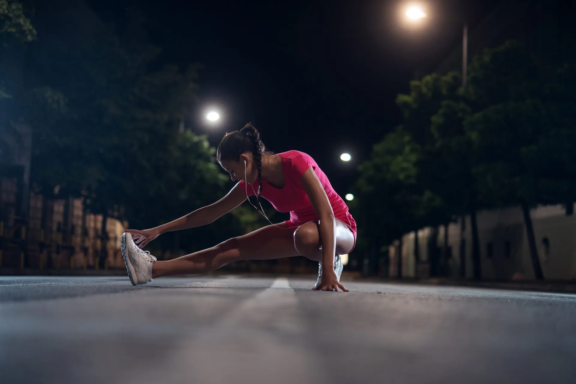 young-girl-doing-fitness-outdoors-night